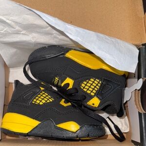 Jordan Black and Yellow Sneakers with Chunky Design